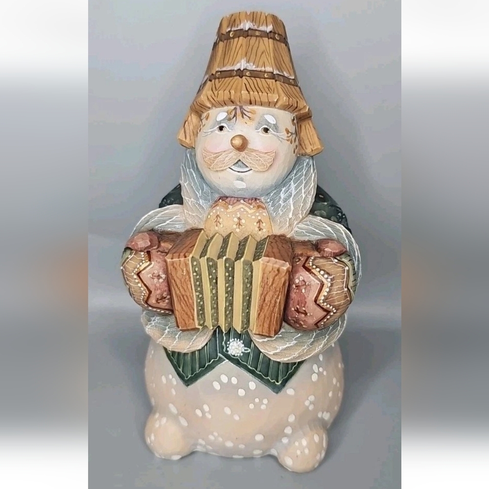 G. Debrekht Festive Figurine with Green and Brown Accents